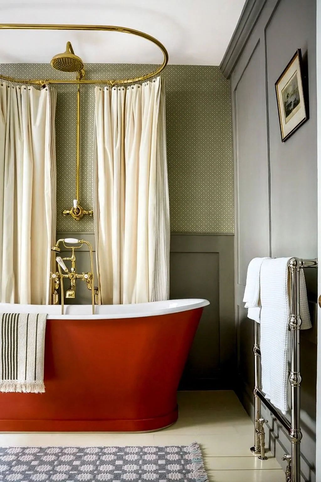 Unlacquered brass shower rail adding timeless style to classic bathroom