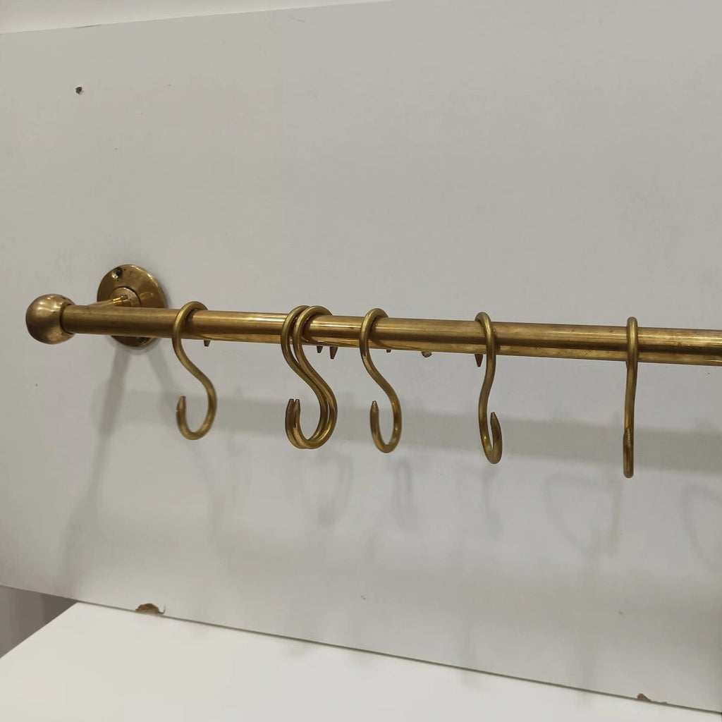 Unlacquered brass kitchen rod with S-hooks, wall-mounted design, perfect for hanging utensils and accessories – Atlas Finest premium handcrafted brass hardware