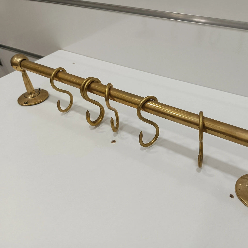 Unlacquered brass wall-mounted kitchen rod with S-hooks, handcrafted design for hanging utensils and accessories – Atlas Finest premium brass hardware
