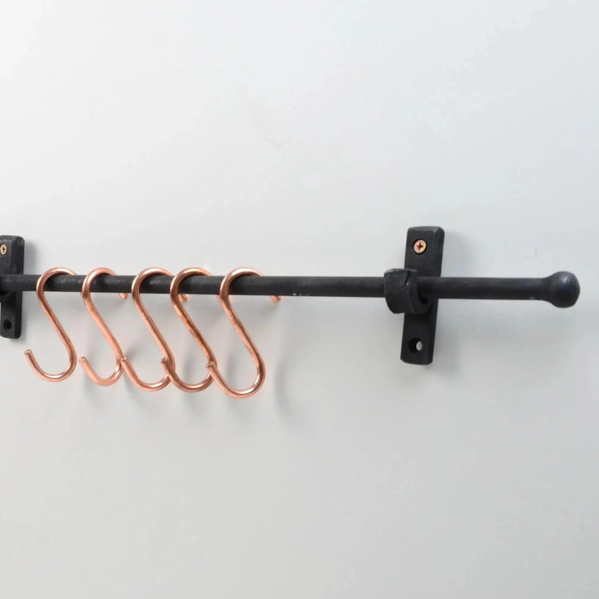 Black iron pot rail with copper S-hooks for stylish kitchen storage – Atlas Finest