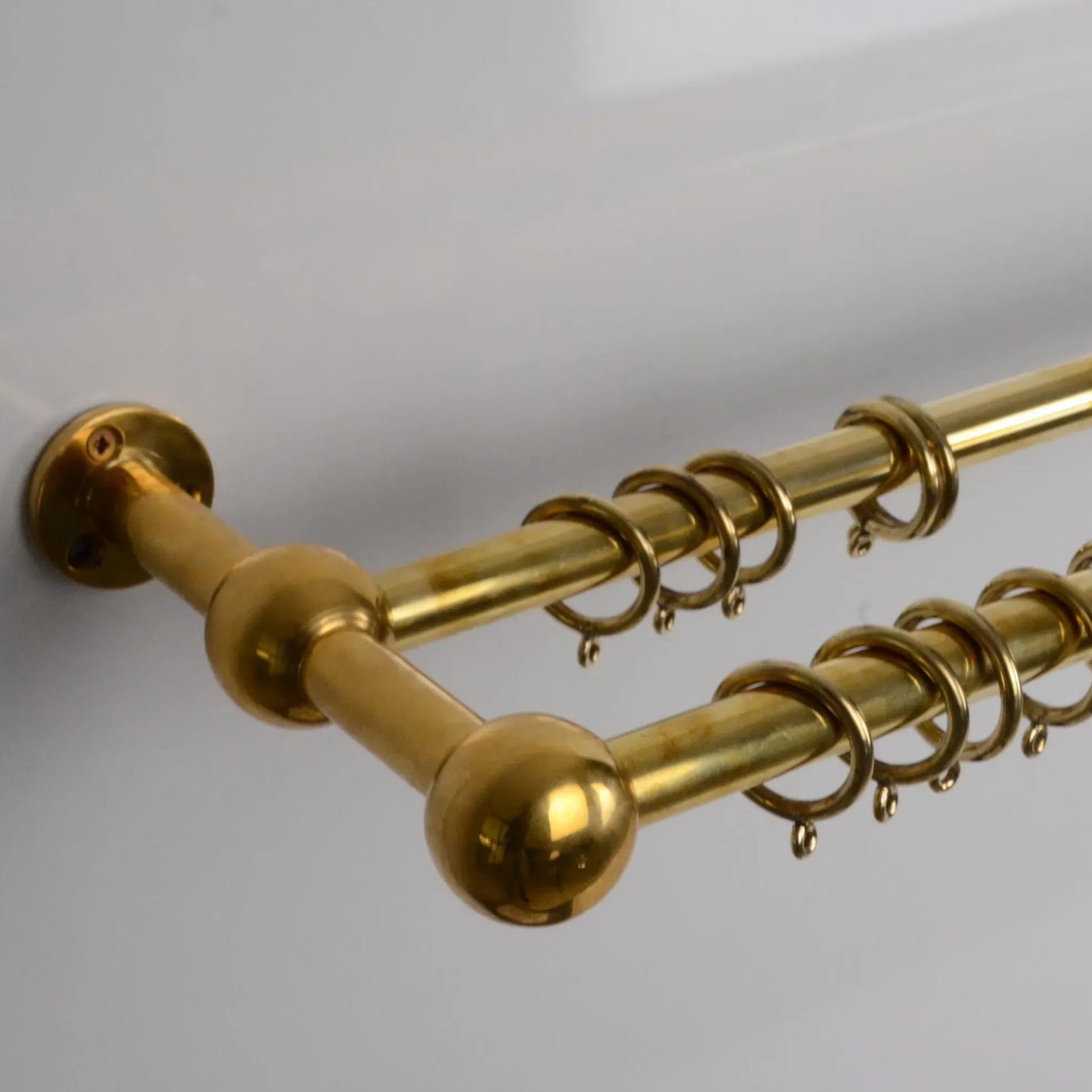 Unlacquered brass double curtain rod with rings for elegant and timeless interiors – Atlas Finest hardware
