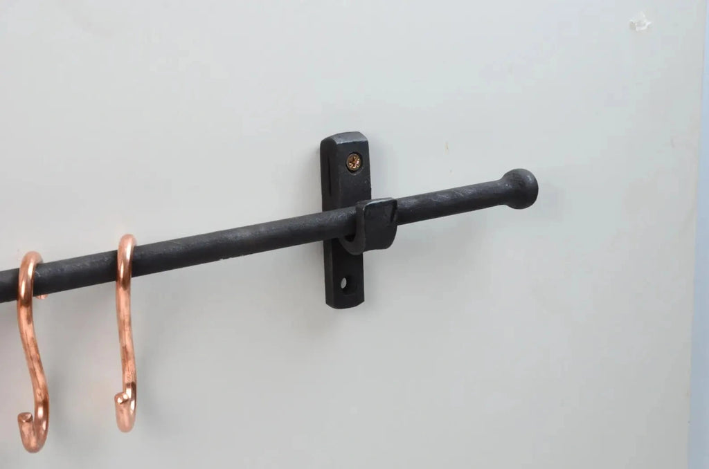 Durable black iron pot rail featuring copper S-hooks for efficient kitchen organization – Atlas Finest