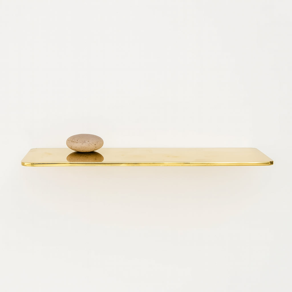 Unlacquered brass floating shelf
