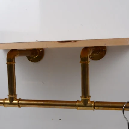 unlacquered brass wall-mounted clothes rack
