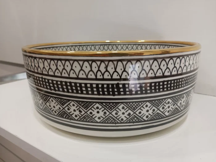 black and white vessel sink
